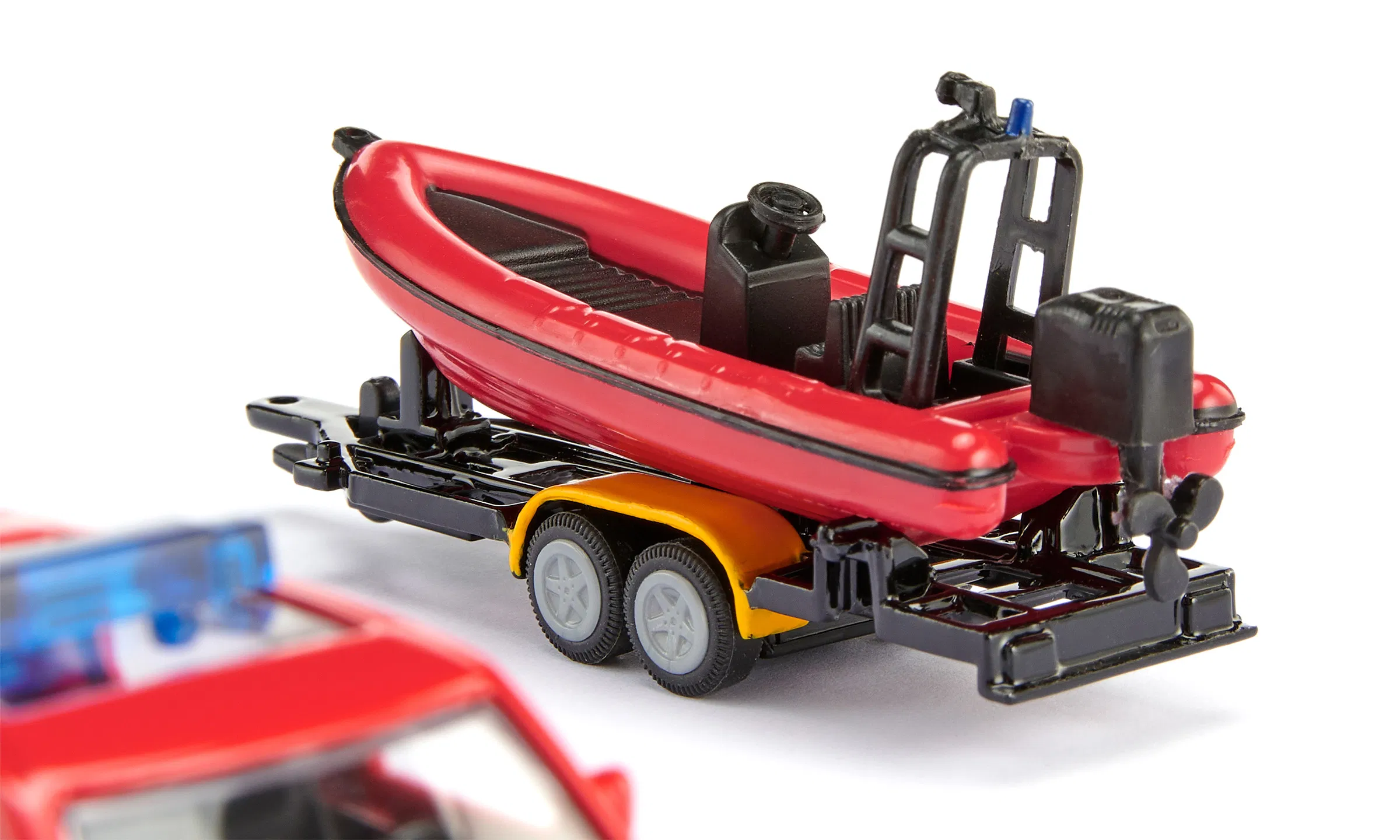 Siku 1:87 Land Rover Defender with Boat – Fire Rescue Model with Trailer and Motorboat